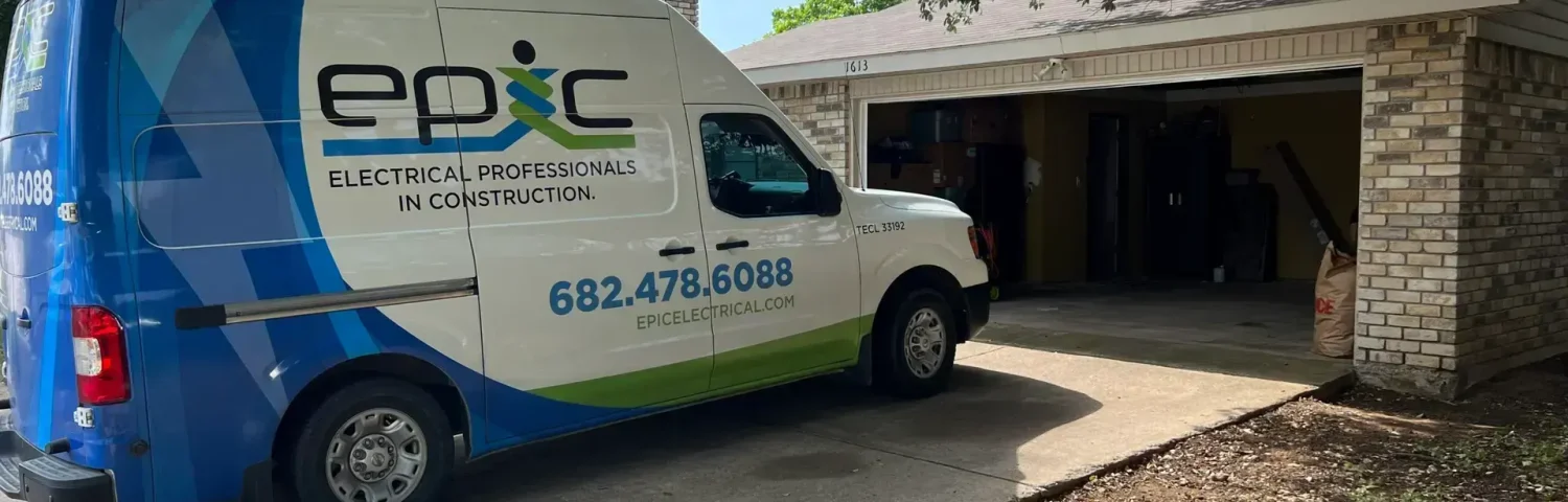 Professional electrician performing electrical panel service in Arlington Texas home
